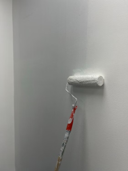 a wall being painted.