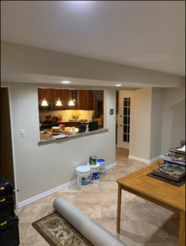 a kitchen with accent lighting.
